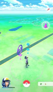 PokeStops - Purple visited Pokestop on left - you're close enough to activate it. Unvisited PokeStop on right.